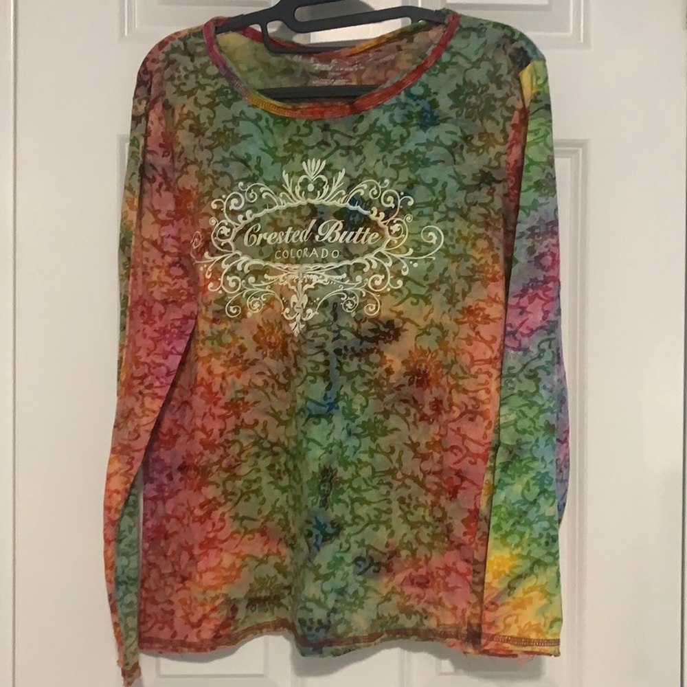 Long sleeve distressed t shirt with logo.